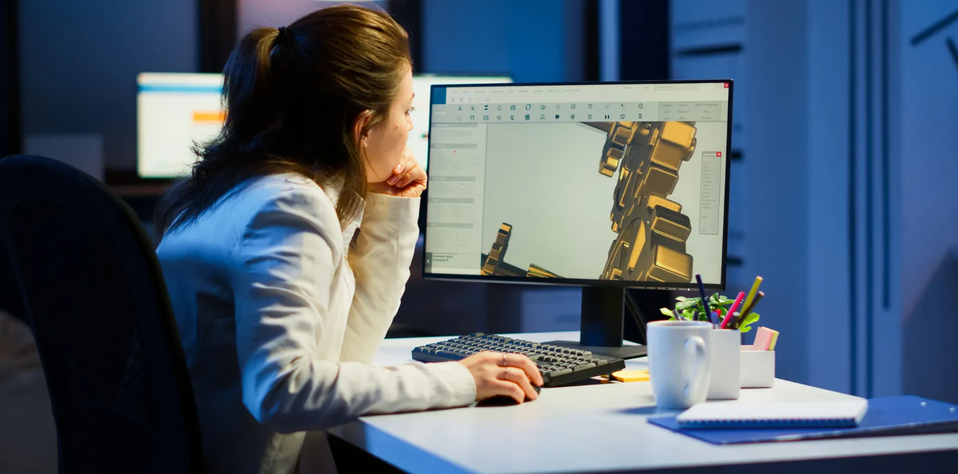 Designer working on a CAD model